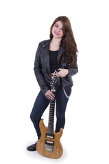 Beautiful sexy young musician girl holding electric guitar