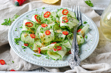 Salad with cucumber, pepper and poppy seeds