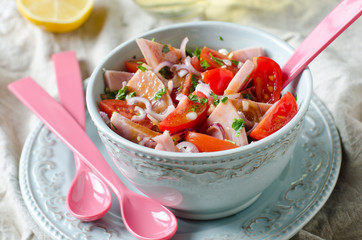 Salad with ham and tomatoes