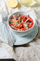 Salad with ham and tomatoes