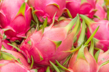 Dragon fruit on market stand, Thailand.