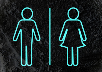 Restroom icon and Pictogram Man Woman Sign on Cement wall textur