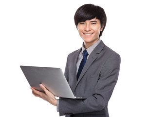 Young businessman use notebook computer