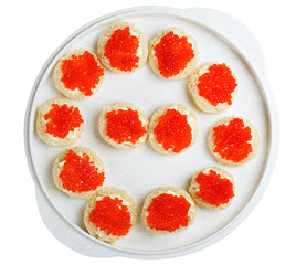 sandwich with red caviar on a tray isolated on white background