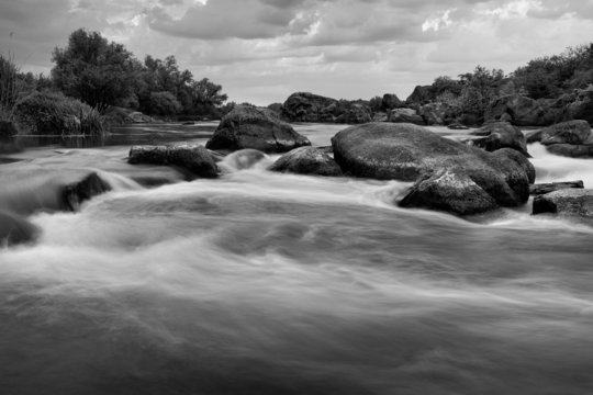 Black and white image of river cascades