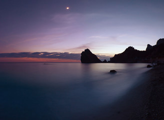 Rocky coastline after sunset