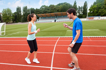 Obraz premium Sport coach training a young attractive woman