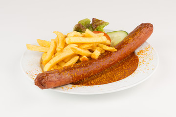 Riesencurrywurst mit Pommes