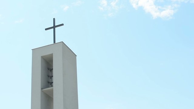 modern church (tower with a crucifix) - blue sky