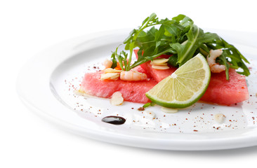 Salad with watermelon, feta, arugula, shrimps, balsamic sauce