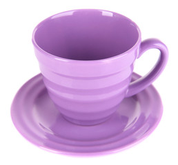 Purple cup and saucer isolated on white