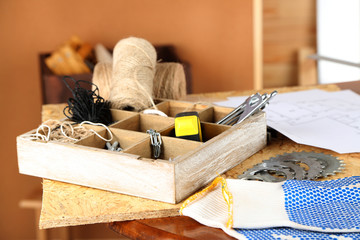 Working tools on table, in workshop