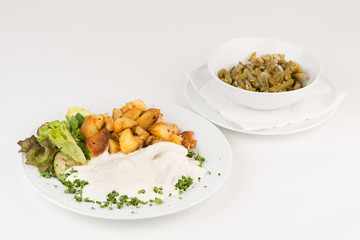 Sahnehering mit Bratkartoffeln