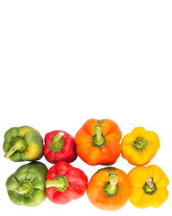 A group of different colors of capsicum over white background