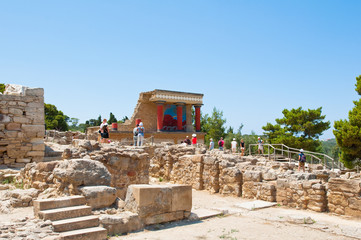 Tourists at the Knossos palace on the Crete island in Greece.