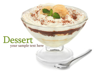 Delicious dessert with banana and caramel isolated on white