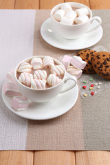 Cups of hot chocolate with marshmallows
