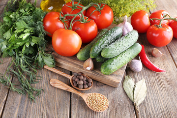 Fresh vegetables with herbs and spices on table, close-up