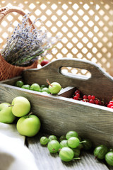 Fresh berries in wooden box, close up