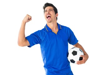 Happy football player in blue celebrating