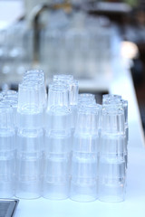 Stacks of clean glasses, indoors