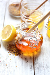Fresh honey on wooden table
