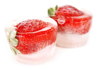 Ice cubes with strawberry isolated on white