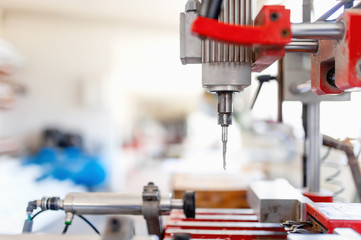 drilling tool in production factory, manufacturing equipment