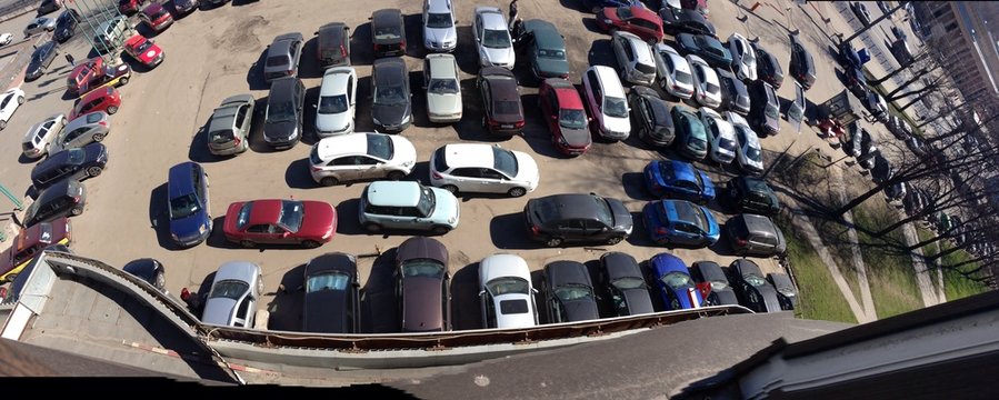a lot of cars on parking