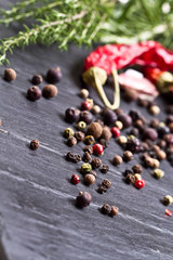Assorted spices on a stone background 