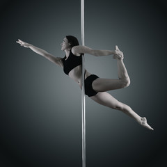 pole dancer, young woman dancing on pylon, toned and noise added