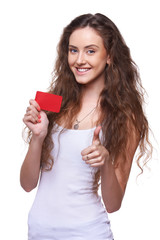 Playful woman showing blank credit card
