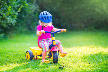Toddler girl on a bike