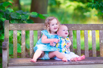 Brother and sister in a park