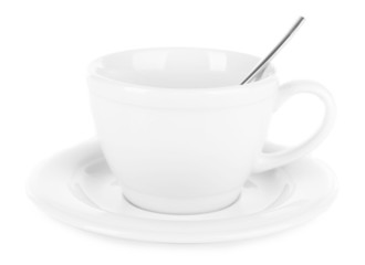 Empty cup with tea spoon isolated on white