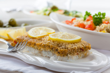 Baked fish fillet wih couscous salad