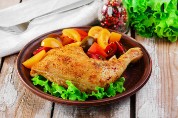 baked chicken leg with tomatoes