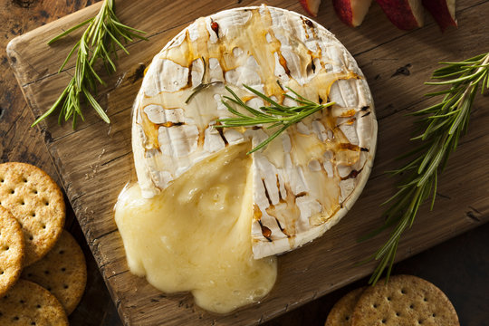 Fototapeta Homemade Baked Brie with Honey