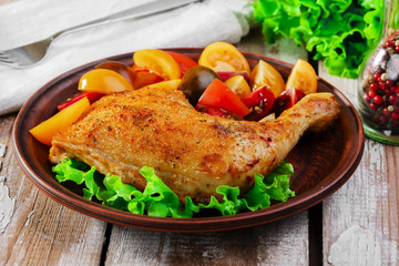baked chicken leg with tomatoes