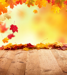 Naklejka na ściany i meble Autumn background with wooden planks