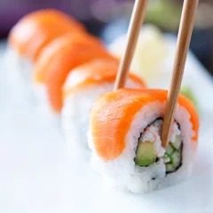 Foto op Plexiglas sushi eten met stokjes © Joshua Resnick