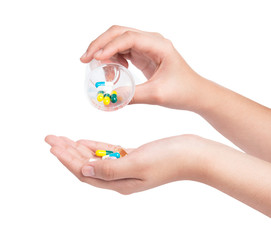 Druge capsules and pills in hand
