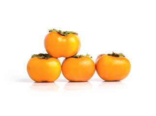 Ripe persimmon isolated on a white background