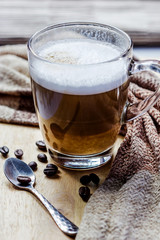 Cup of coffee on a wooden table