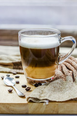 Cup of coffee on a wooden table