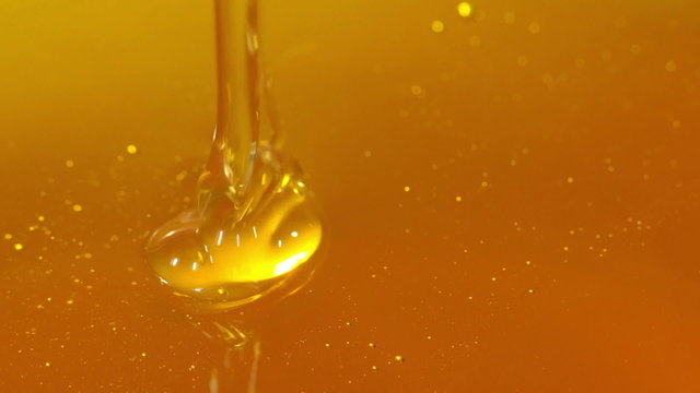 Close-up of honey dripping.