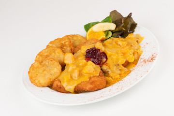 Putenschnitzel in Frucht-Curry-Soße