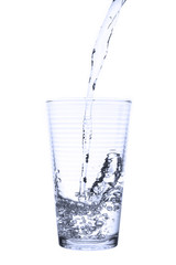 water splashing from curly glass isolated on white background.