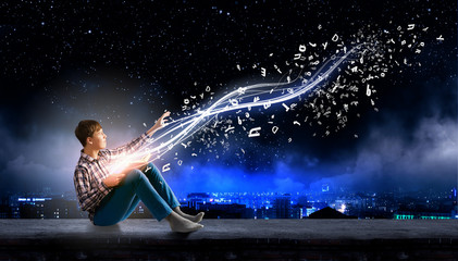 Fototapeta premium Guy reading book