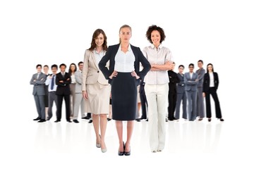 Obraz premium Composite image of team of businesswomen looking at camera